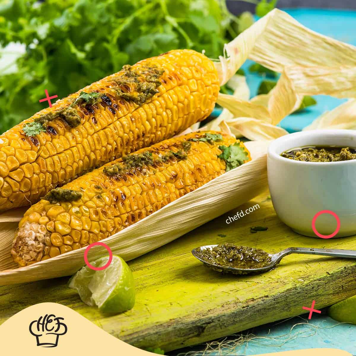 Image of whole corn cob grilled in husk.