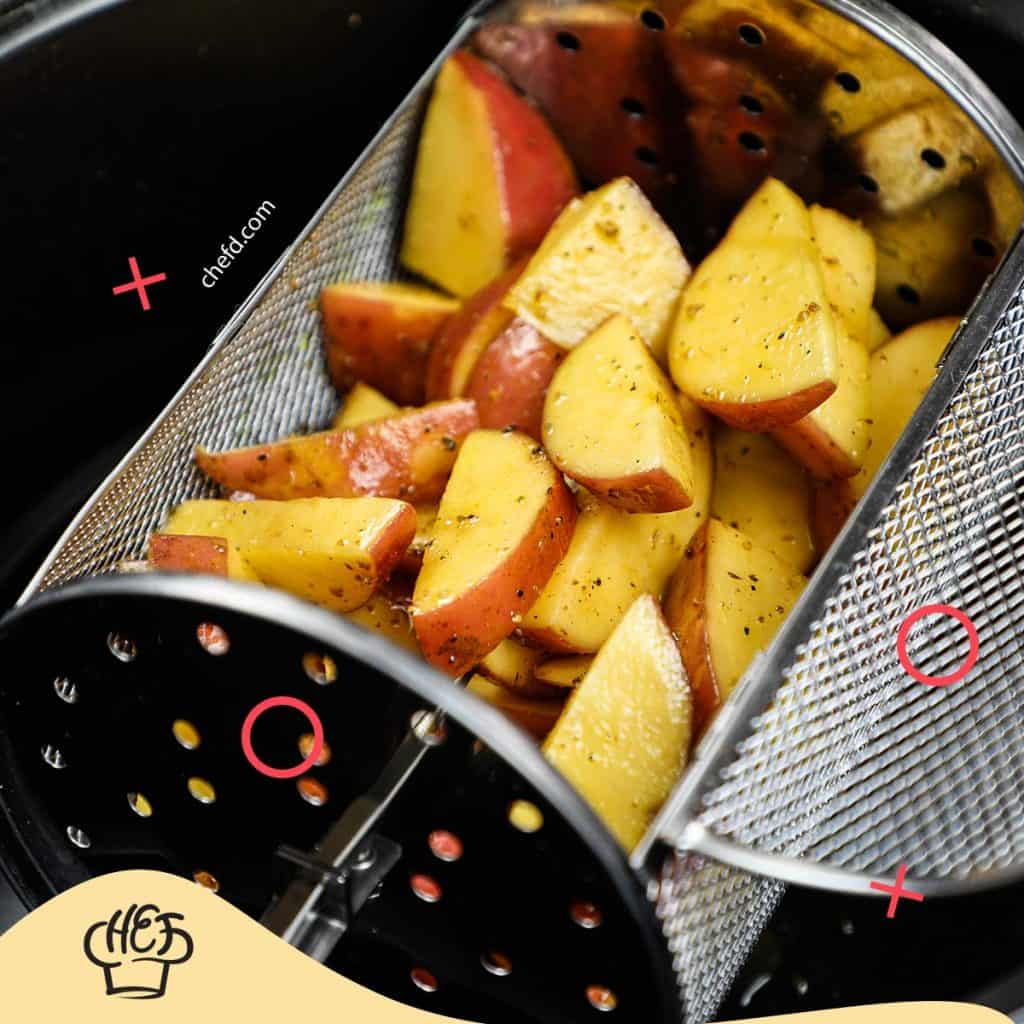 Image of potato wedges in air fryer.