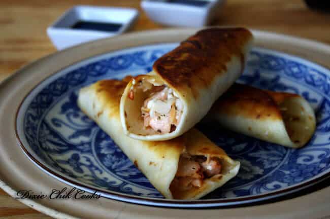 Image with Salmon and Wasabi Coleslaw Taquitos.