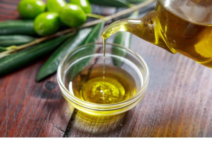 Olive oil and olive twig
