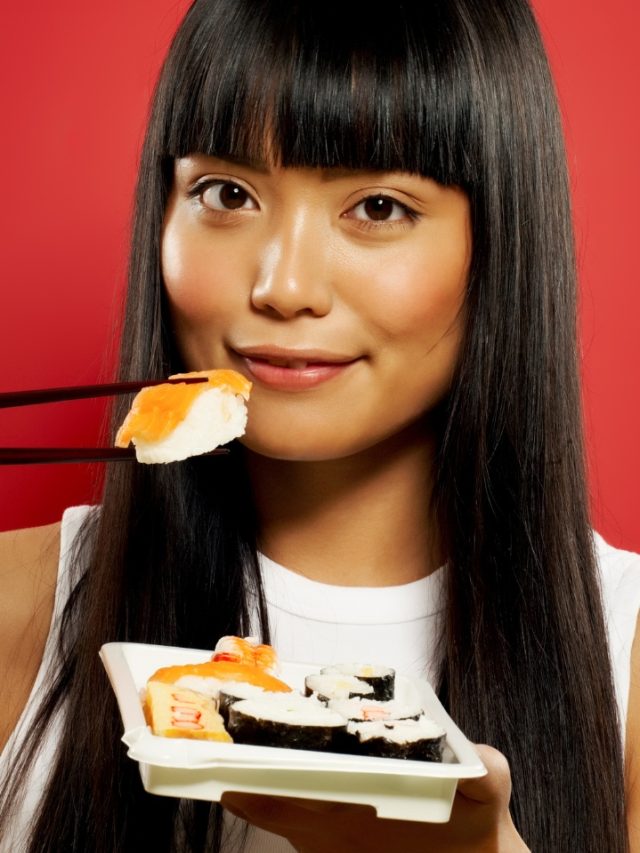 young-woman-enjoying-sushi-chefd-com